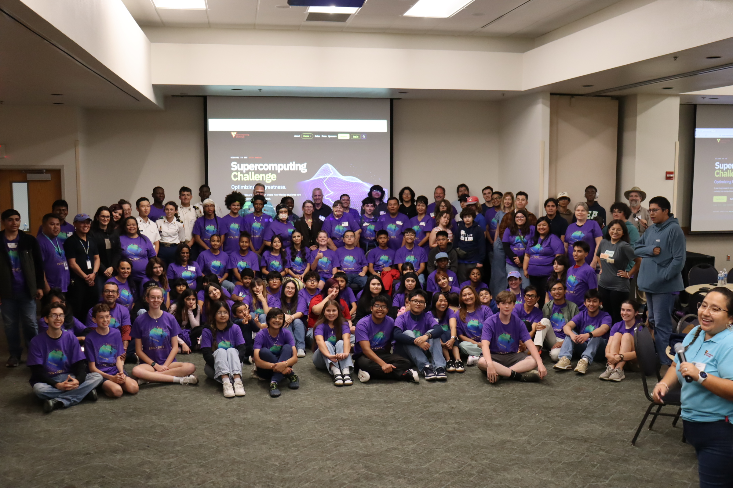 The full Kickoff group posed in front of the Challenge welcome screen